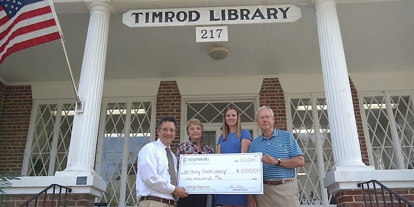 Timrod-Library-Donation-with-Attorney-Steven-Goldberg-and-Attorney-Kelly-Alfreds-Brighter-Version